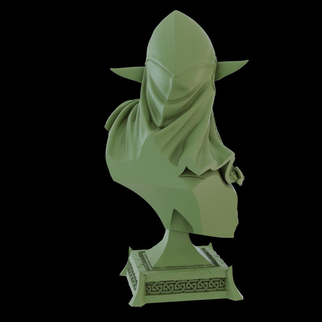 a statue of a person wearing a cloak