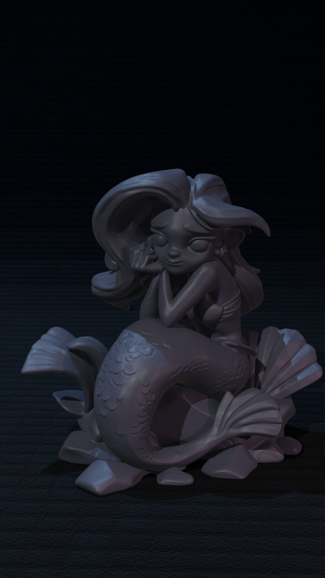 a statue of a mermaid sitting on top of a fish