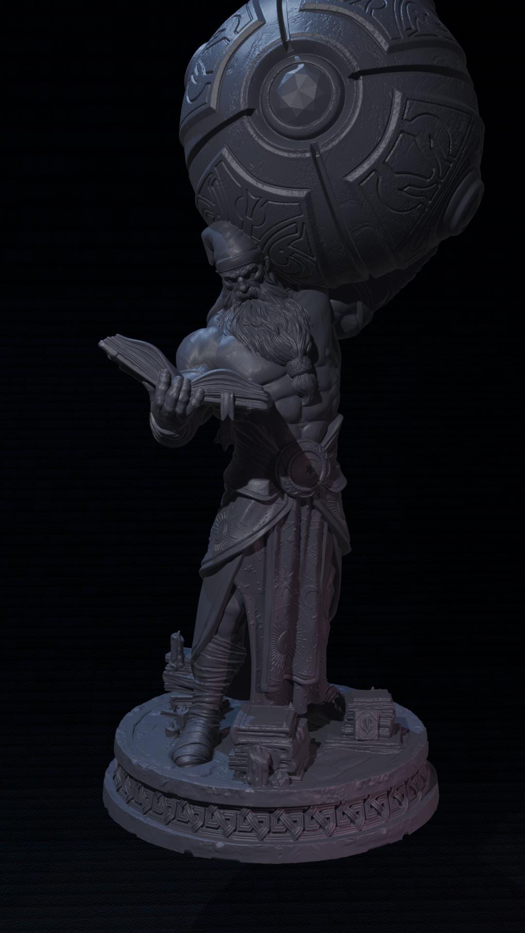 a statue of a man holding a book