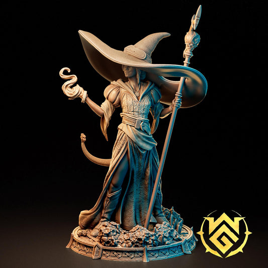 a statue of a wizard holding a staff