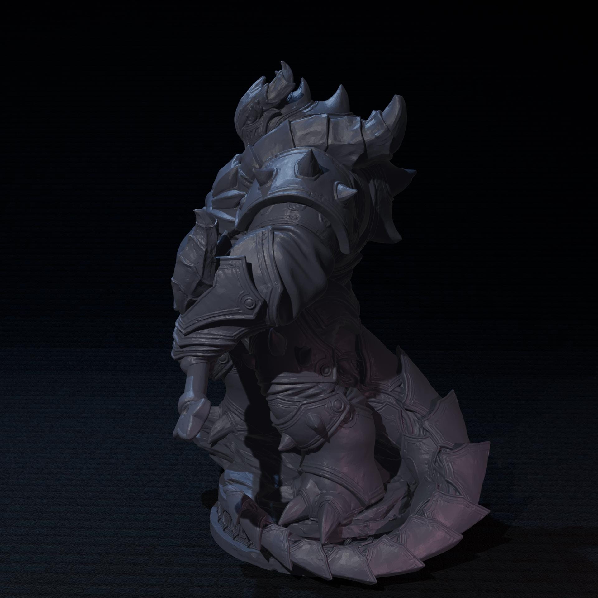 a statue of a creature in a dark room