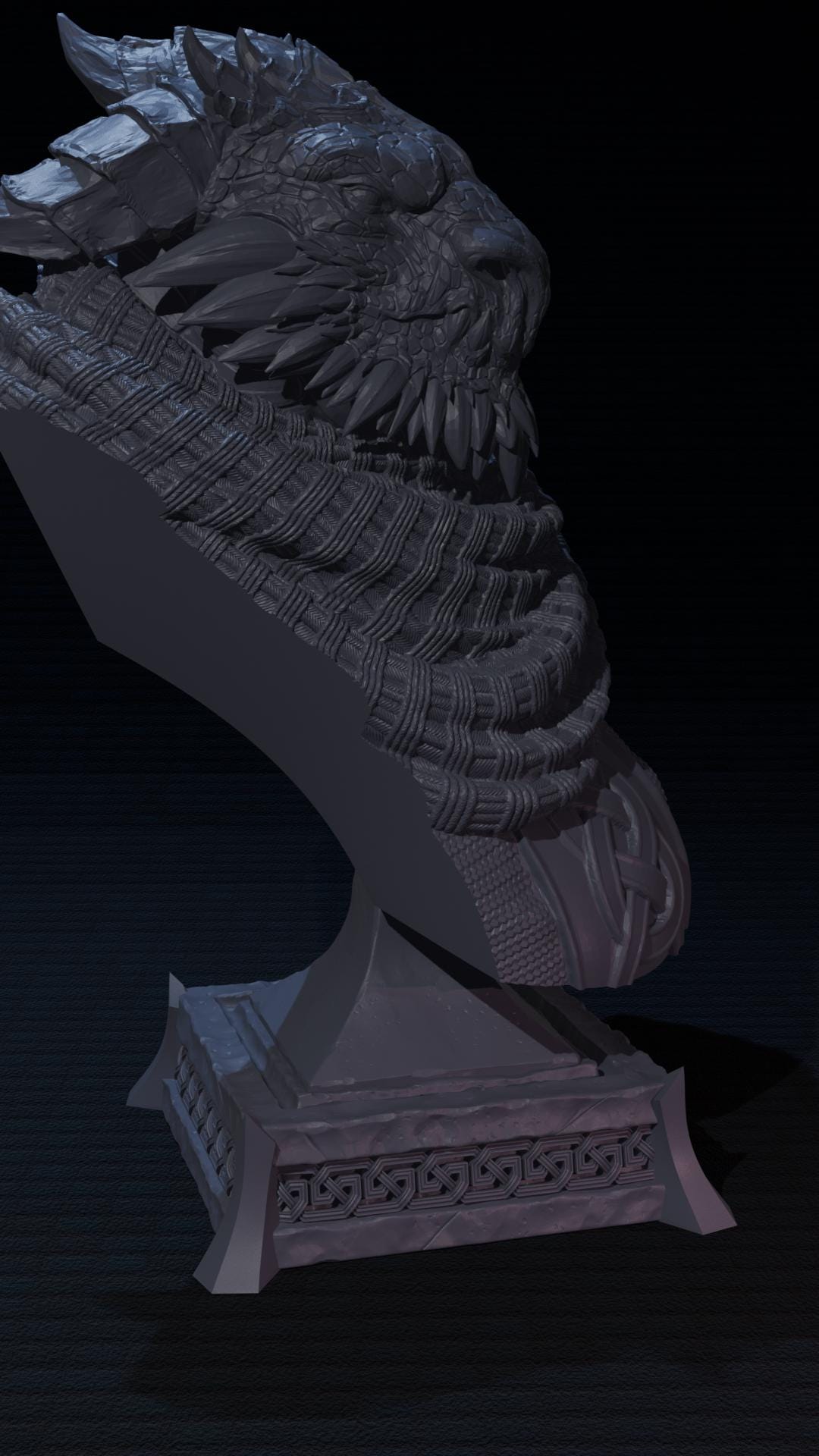 a sculpture of a bird on a pedestal